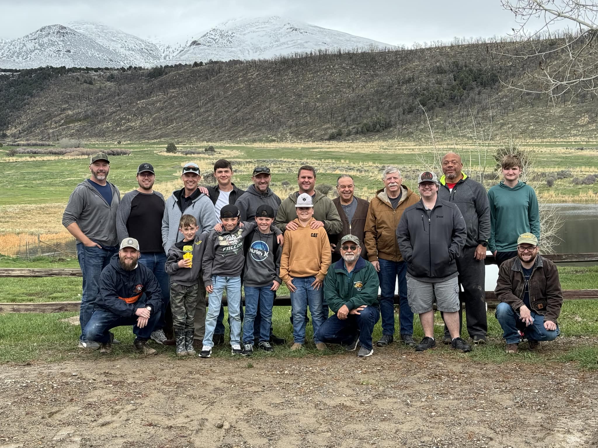A group of men gathered at a retreat