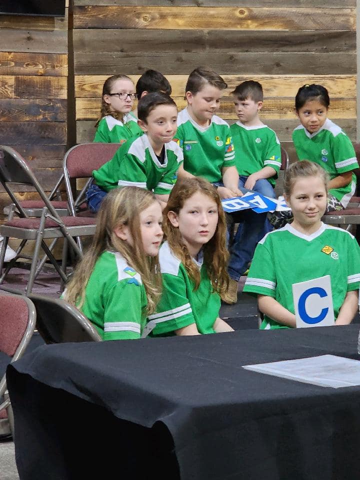 AWANA students listening during a lesson